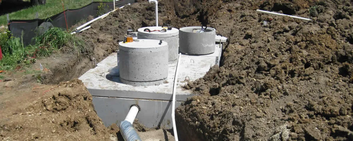 Septic system repair and installation site with tank access ports in Cherry Hill, NJ